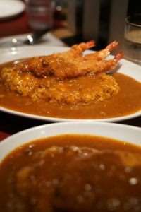 Serving and Enjoying Crab Curry