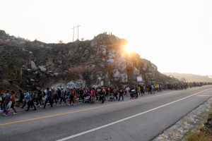 Migrants walk in a caravan in an attempt to reach the U.S. border, in Arriaga, Chiapas state, Mexico January 8.