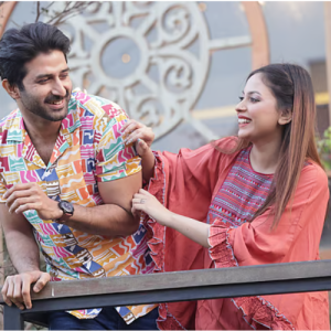 The abstract design on the boy's shirt catches the eye. Kaftan cut top with light colors and designs. All day long rides will have both comfort and style